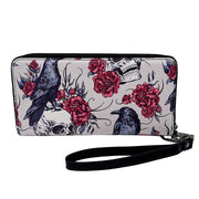 Wallet with skull and rose design on a white background