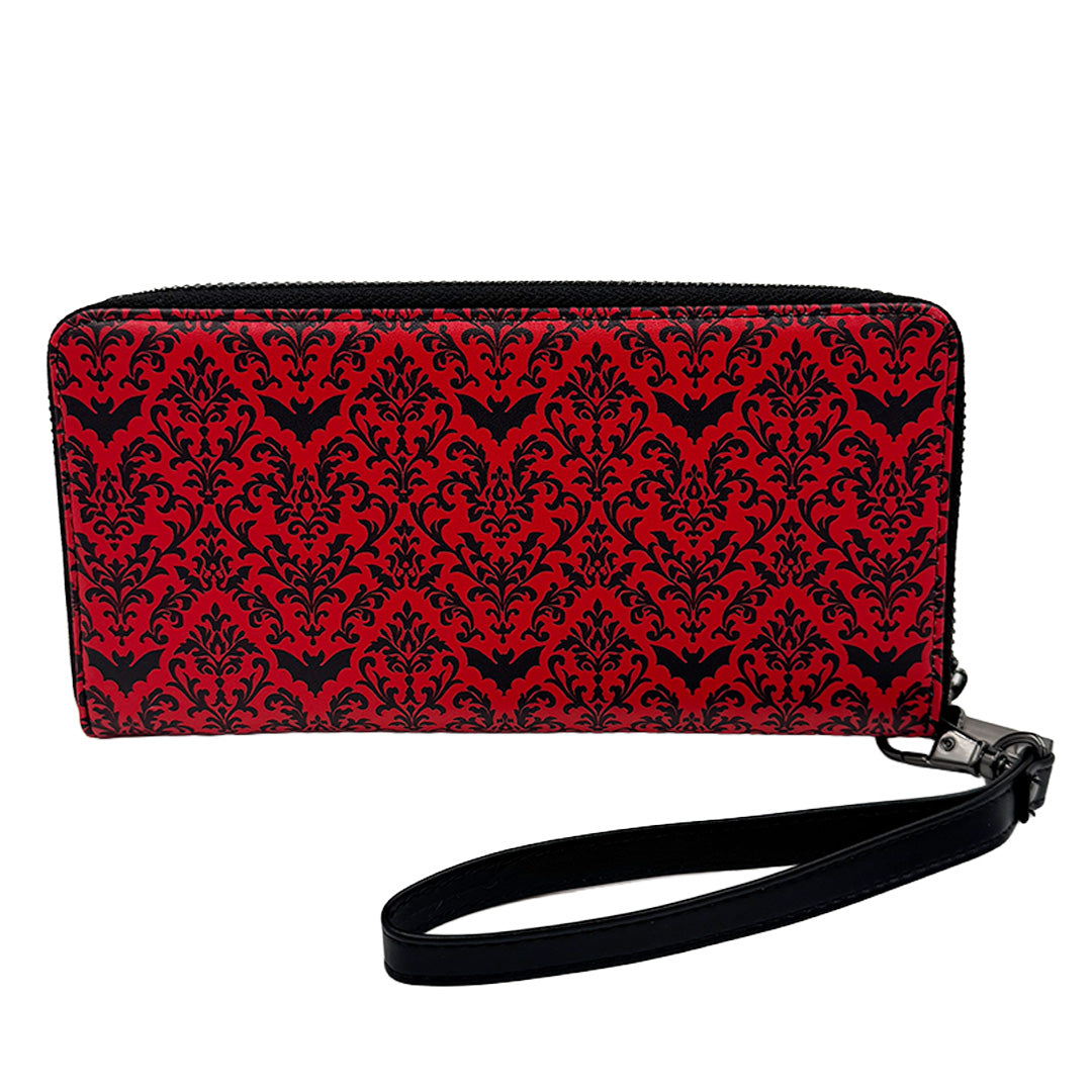 Red and black patterned wallet with a strap on a white background