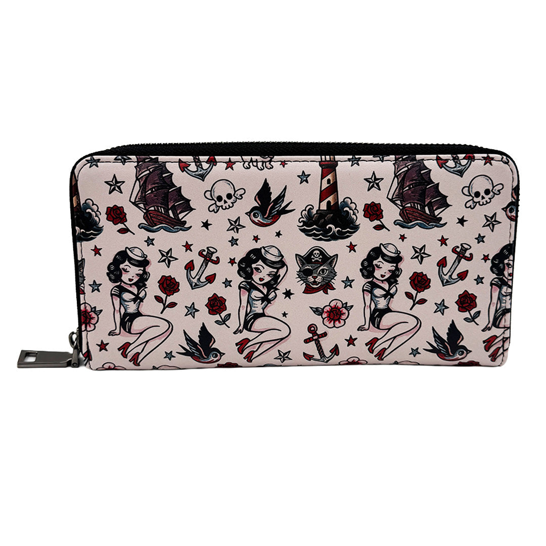 Wallet with vintage tattoo design featuring pin-up girls, ships, and lighthouses on a light background.