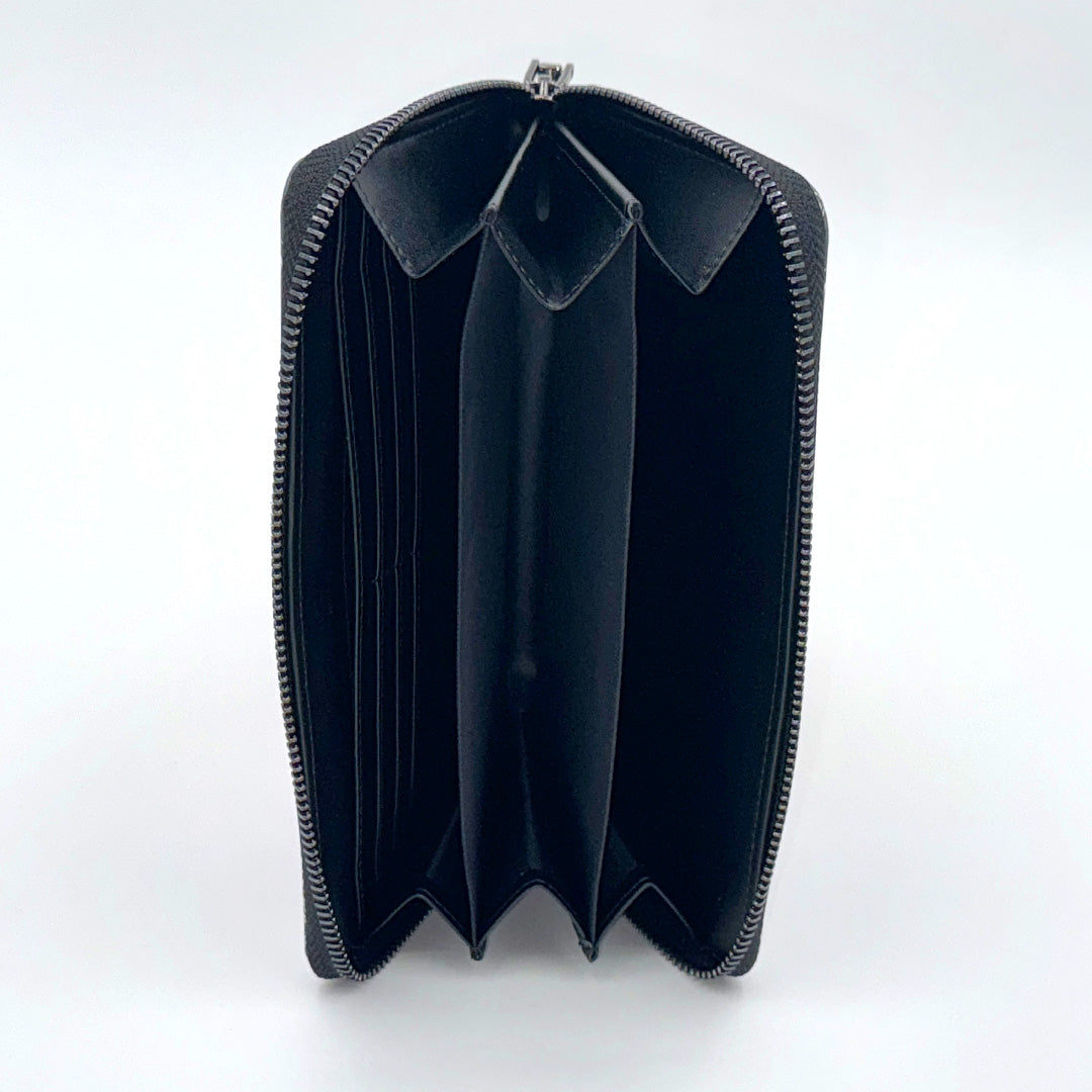 Black wallet with a zipper on a white background